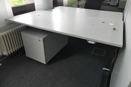 1x elektrisch in hoogte verstelbaar bureau met 1x bureauladeblok