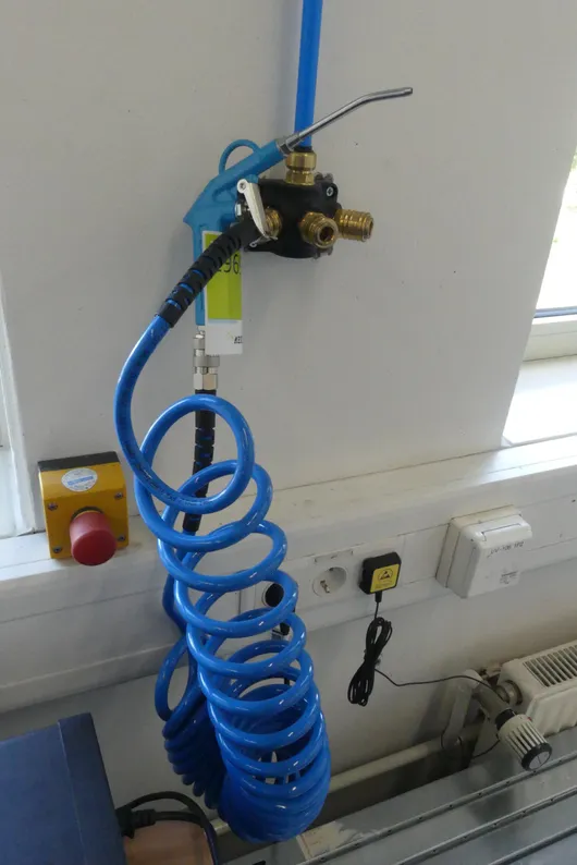 Pneumatische pistool met spiraalslang