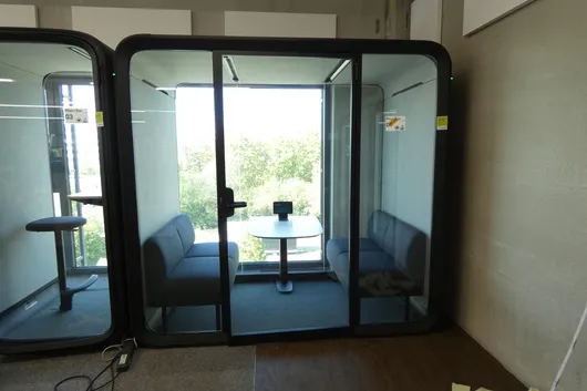 Meeting cabin with contents