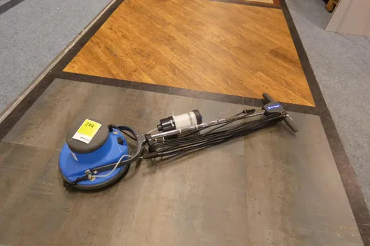 Dr. Schutz single-disc machine with tank for cleaning agent
