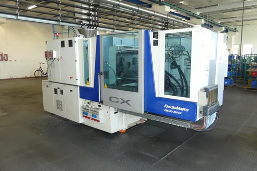 KRAUSS MAFFEI KM-100-380CX injection molding machine