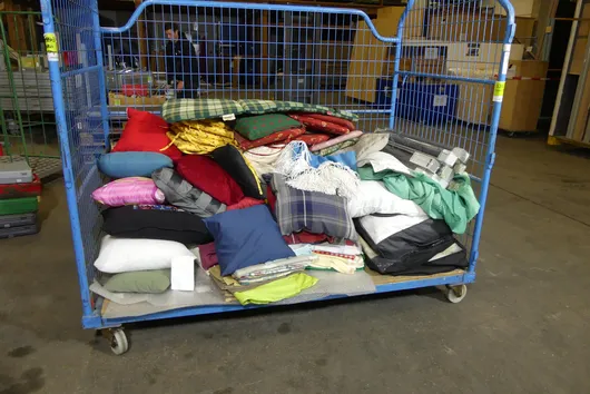 Lot of cushions and fabrics